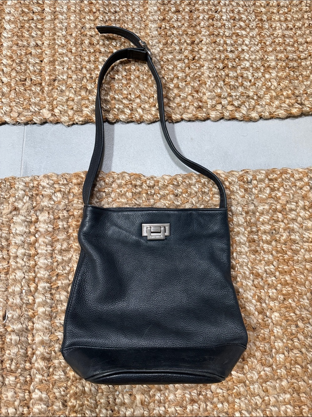Tignanello Black Pebble Leather Messenger Bag with Silver Turn-Lock